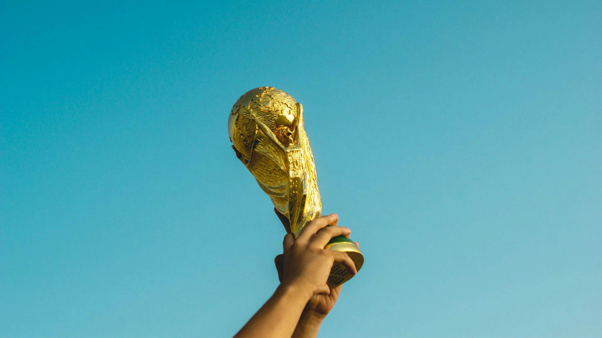 Hands Holding a Trophy in the Air